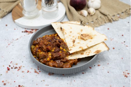 chilli con carne de porc